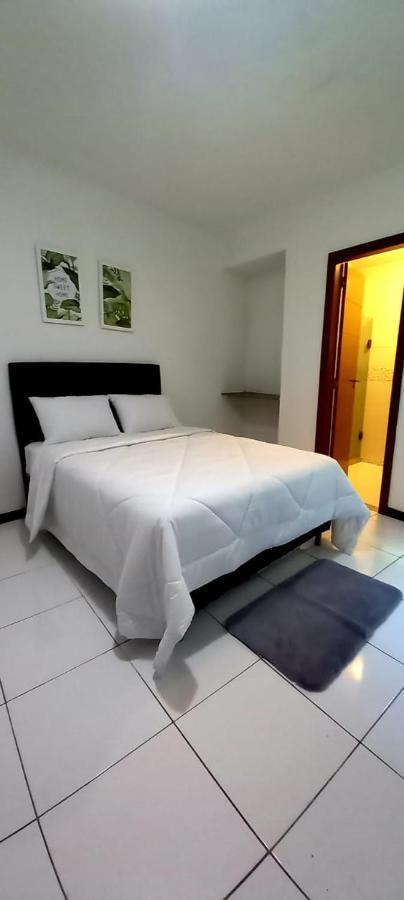 Bliss Hoteis Centro Búzios Kültér fotó A bedroom with a bed and a bathroom