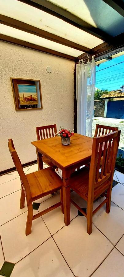 Bliss Hoteis Centro Búzios Kültér fotó A dining room table with four chairs