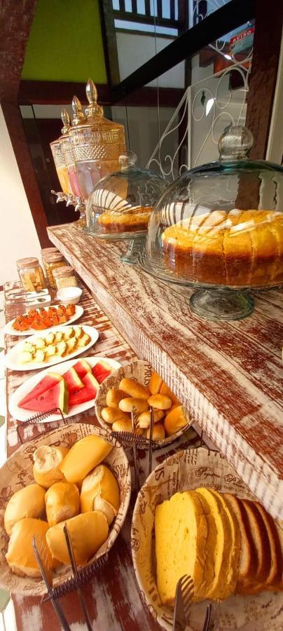 Bliss Hoteis Centro Búzios Kültér fotó A selection of fruit and cake